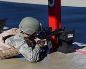 Airman fires a weapon