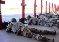 Airmen fire weapons