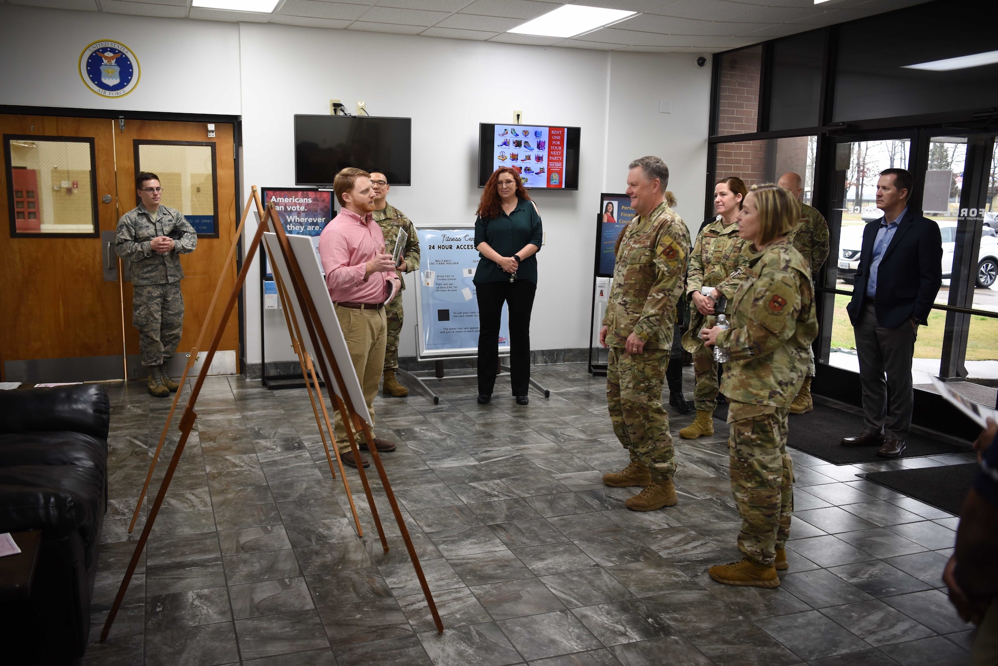 U.S. Air Force Lt. Gen. Brad Webb, commander of Air Education and Training Command, and Chief Master Sgt. Juliet Gudgel, command chief of AETC, are presented a layout of the Columbus Air Force Base Fitness Center Feb. 5, 2020, on Columbus AFB, Mississippi. AETC leadership visited Columbus AFB to view the 14th Flying Training Wings mission, meet its key leaders, and recognize outstanding members of the base for their achievements. (U.S. Air Force photo by Airman 1st Class Jake Jacobsen)