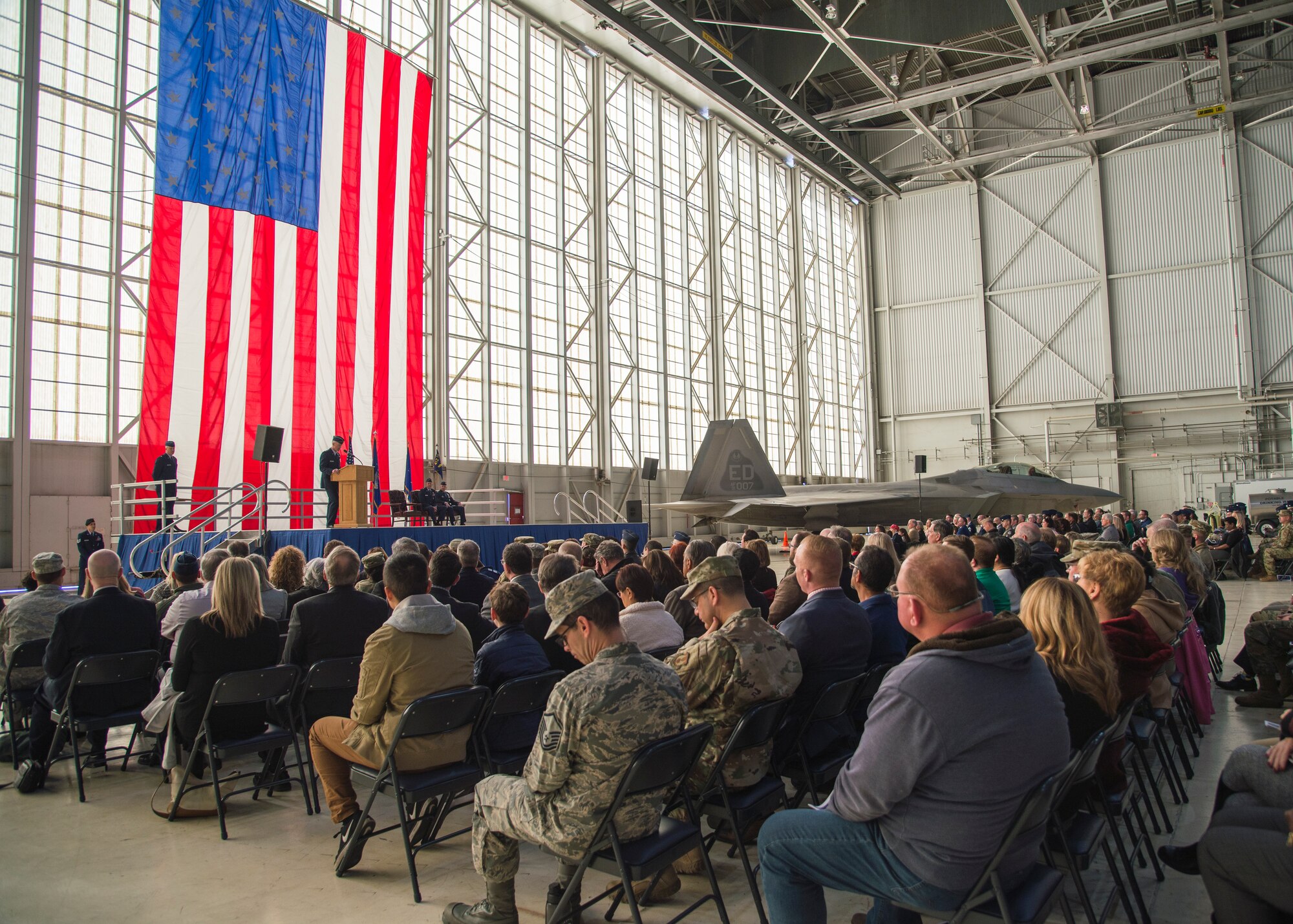 Maj. Gen. Christopher Azzano, Air Force Test Center Commander, gives remarks during the 412th Test Wing Change of Command Ceremony between outgoing commander, Brig. Gen. E. John Teichert, and incoming commander, Col. Matthew Higer, at Edwards Air Force Base, California, Feb. 5. (Air Force photo by Giancarlo Casem)
