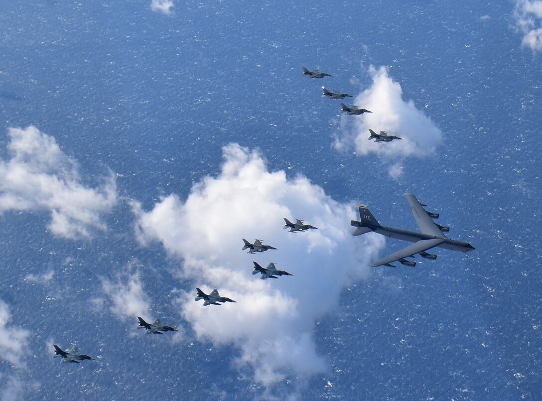 A U.S. Air Force B-52H Stratofortress from Minot Air Force Base, North Dakota, six F-16 Fighting Falcons and four Japan Air Self-Defense Force F-2s from Misawa Air Base, Japan, fly in formation off the coast of Northern Japan as part of a combined Continuous Bomber Presence and Bomber Task Force mission, Feb. 3, 2020. U.S. Strategic Command's bomber forces regularly conduct combined theater security cooperation engagements with allies and partners, demonstrating U.S. capability to command, control and conduct bomber missions around the world. (Courtesy photo by the Japan Air Self-Defense Force)