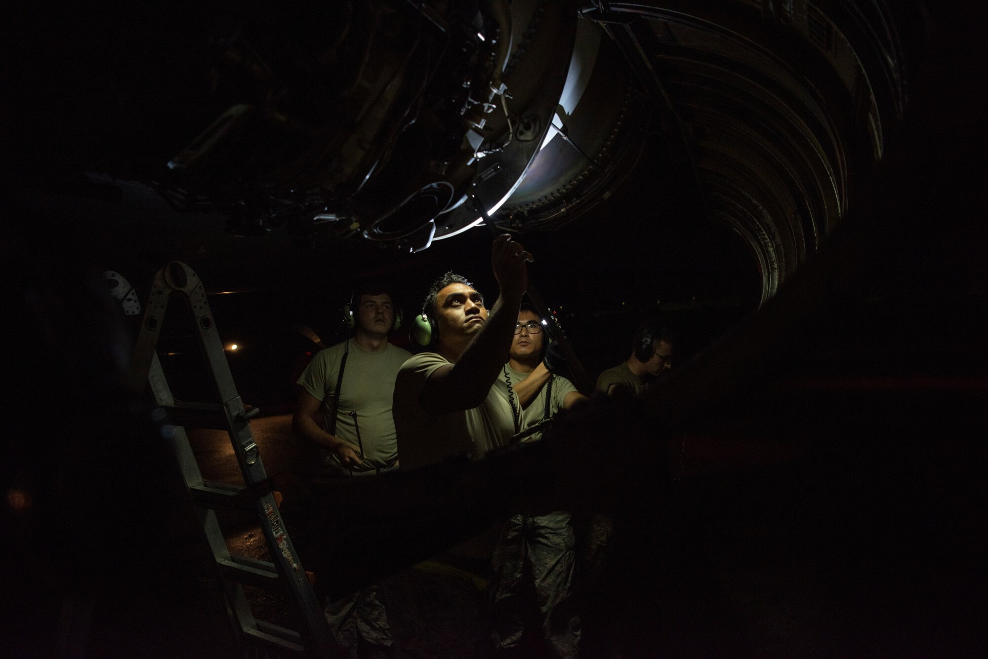 Airmen assigned to the 69th Aircraft Maintenance Squadron inspect a B-52H Stratofortress engine before a flight at Andersen Air Force Base, Guam, Feb. 3, 2020. Strategic bomber missions enhance the readiness and training necessary to respond to any potential crisis or challenge across the globe. (U.S. Air Force photo by Airman 1st Class Michael S. Murphy)