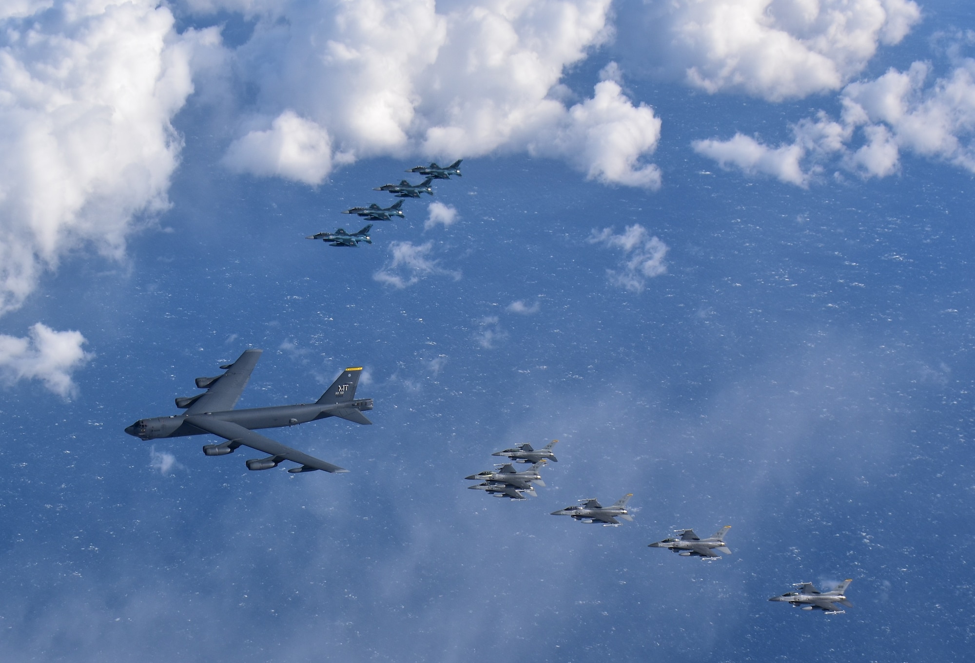 A U.S. Air Force B-52H Stratofortress from Minot Air Force Base, North Dakota, six F-16 Fighting Falcons and four Japan Air Self-Defense Force F-2s from Misawa Air Base, Japan, fly in formation off the coast of Northern Japan as part of a combined Continuous Bomber Presence and Bomber Task Force mission, Feb. 3, 2020. U.S. Strategic Command's bomber forces regularly conduct combined theater security cooperation engagements with allies and partners, demonstrating U.S. capability to command, control and conduct bomber missions around the world. (U.S. Air Force photo by Staff Sgt. Melanie A. Bulow-Gonterman)