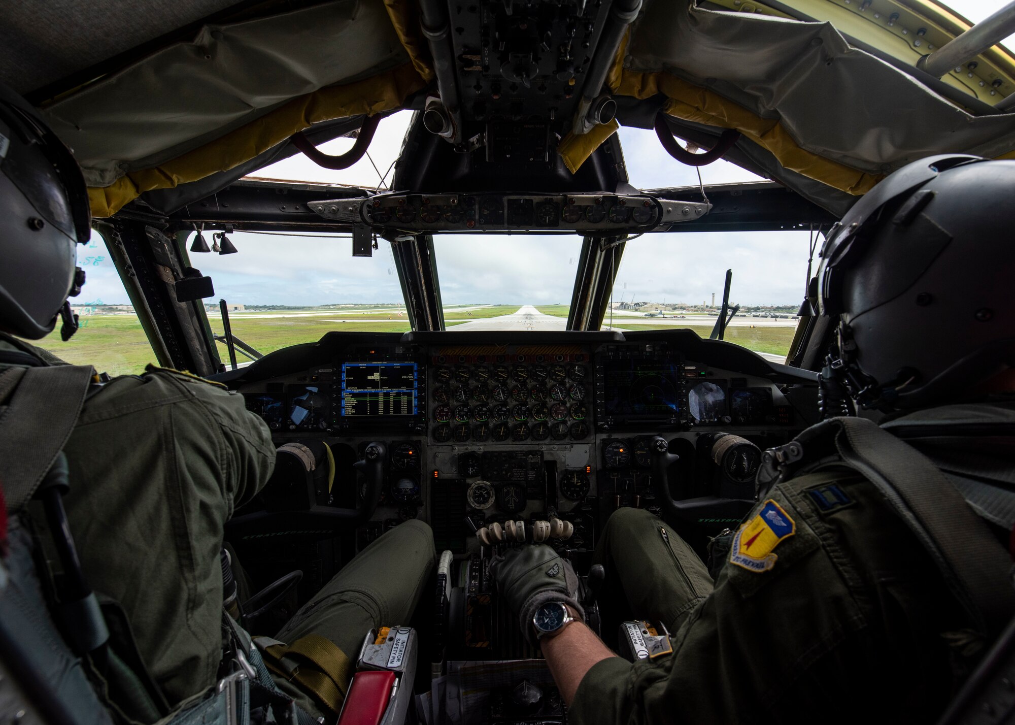 U.S. Air Force Capt. Wesley Fite, a 5th Operation Support Squadron pilot attached to the 69th Expeditionary Bomb Squadron, deployed from Minot Air Force Base, North Dakota, (left) and U.S. Air Force Capt. Patrick Mason, a pilot with the 69th Expeditionary Bomb Squadron (right), prepare for takeoff in a B-52H Stratofortress at Andersen Air Force Base, Guam, Feb. 3, 2020. U.S. Strategic Command has conducted bomber task force missions since 2014 as a demonstration of the U.S. commitment to collective security, and to integrate with Geographic Combatant Command operations. (U.S. Air Force photo by Senior Airman Zachary Neal)