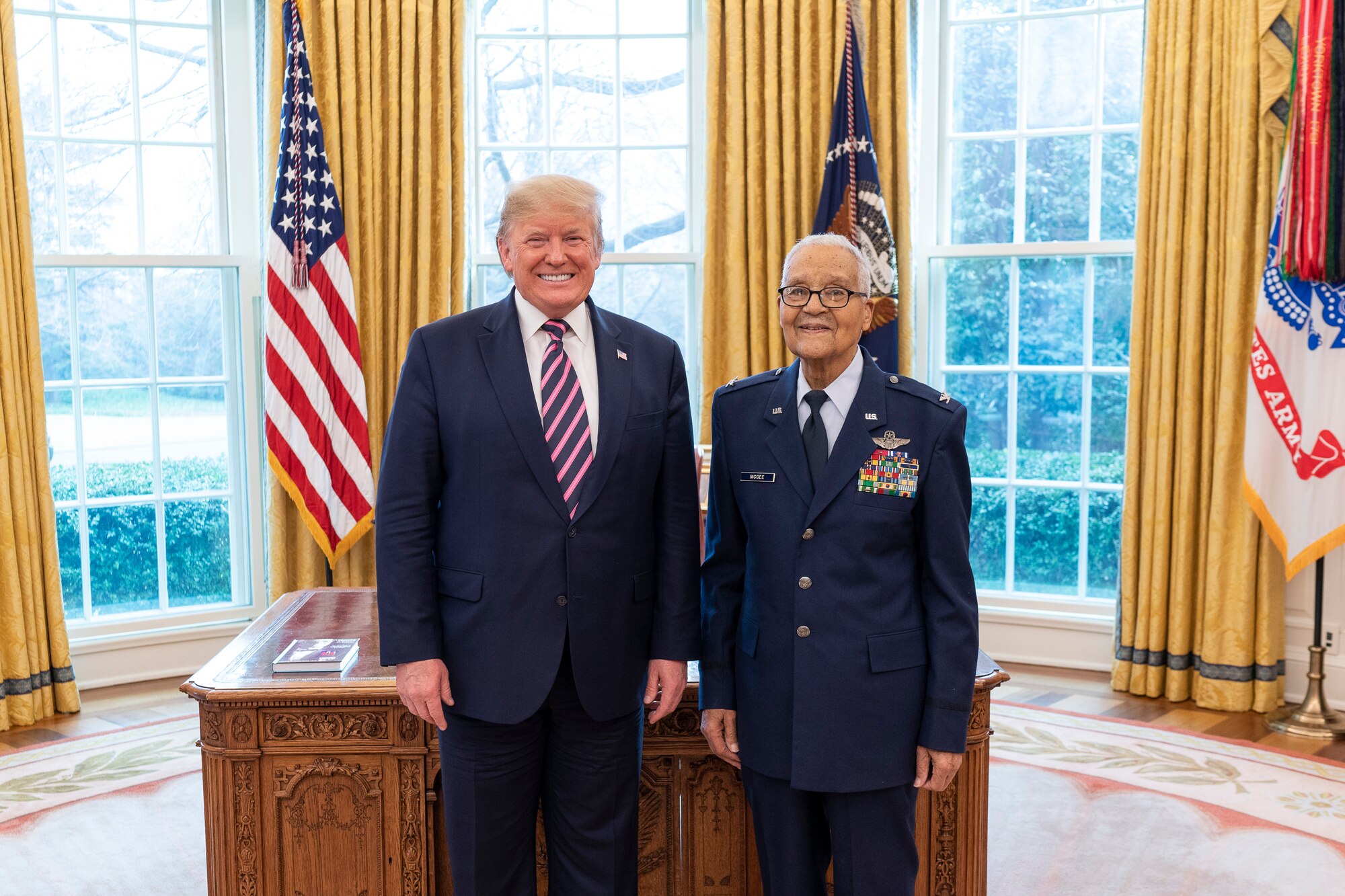 President Donald J. Trump welcomes State of the Union Gallery guest and Tuskegee Airman, retired Col. Charles McGee, Feb. 4, 2020, to the Oval Office of the White House before McGhee’s promotion to brigadier general. (Official White House Photo by Shealah Craighead)