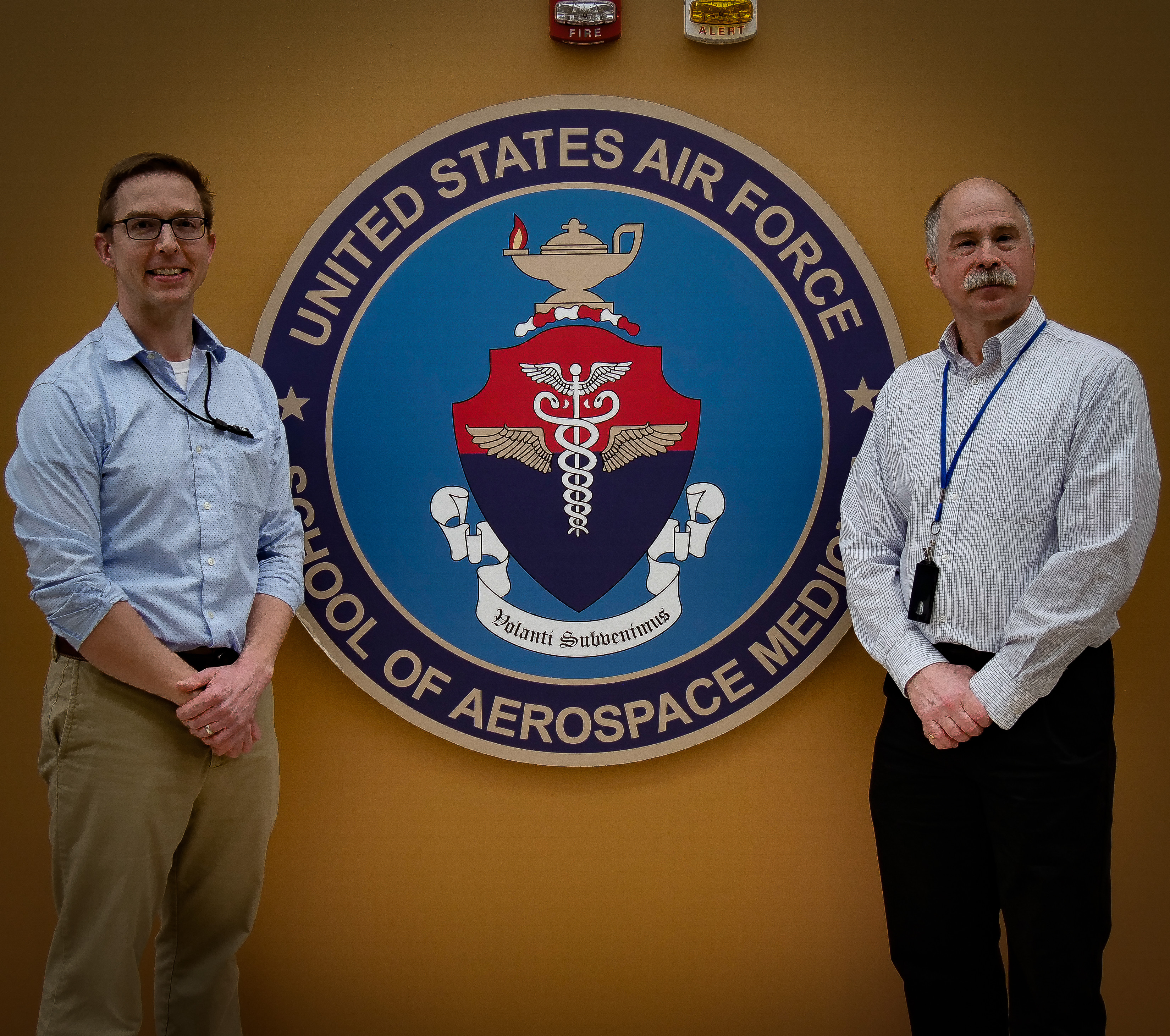 Dr. Anthony Fries, a bioinformatics scientist, (left), and Dr. Paul Sjoberg, a program manager with the Department of Defense Global Respiratory Pathogen Surveillance Program at USAFSAM’s Epi Lab, discuss how the lab and the Centers for Disease Control and Prevention monitor influenza to provide the U.S. Food and Drug Administration critical data for manufacturers of the flu vaccine in Episode 21 of AFRL’s “Lab Life” podcast, now available for download. (U.S. Air Force photo/Keith Lewis)