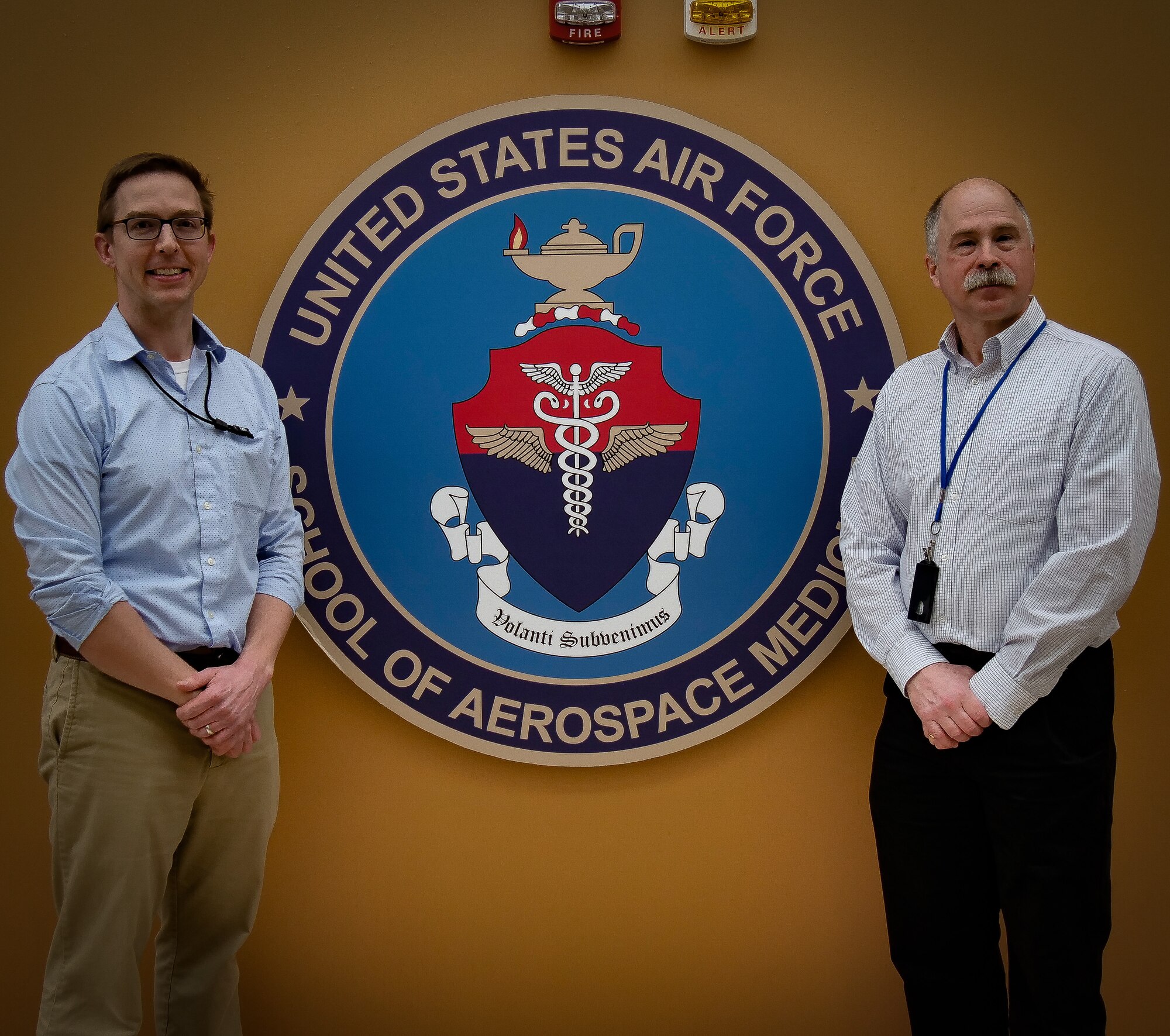 Dr. Anthony Fries, a bioinformatics scientist, (left), and Dr. Paul Sjoberg, a program manager with the Department of Defense Global Respiratory Pathogen Surveillance Program at USAFSAM’s Epi Lab, discuss how the lab and the Centers for Disease Control and Prevention monitor influenza to provide the U.S. Food and Drug Administration critical data for manufacturers of the flu vaccine in Episode 21 of AFRL’s “Lab Life” podcast, now available for download. (U.S. Air Force photo/Keith Lewis)