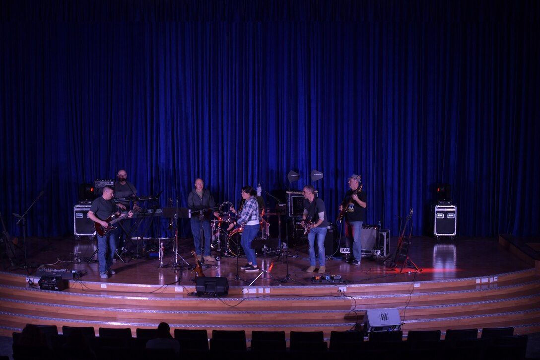 Members of the Air Forces Central Command Band perform for deployed members in The Rock theater at Ali Al Salem Air Base, Kuwait January 3, 2020. These dynamic musicians perform and tour in small ensembles throughout the AOR to positively promote troop morale, diplomacy and outreach to host nation communities. (U.S. Air Force photo by Tech. Sgt. Alexandre Montes)