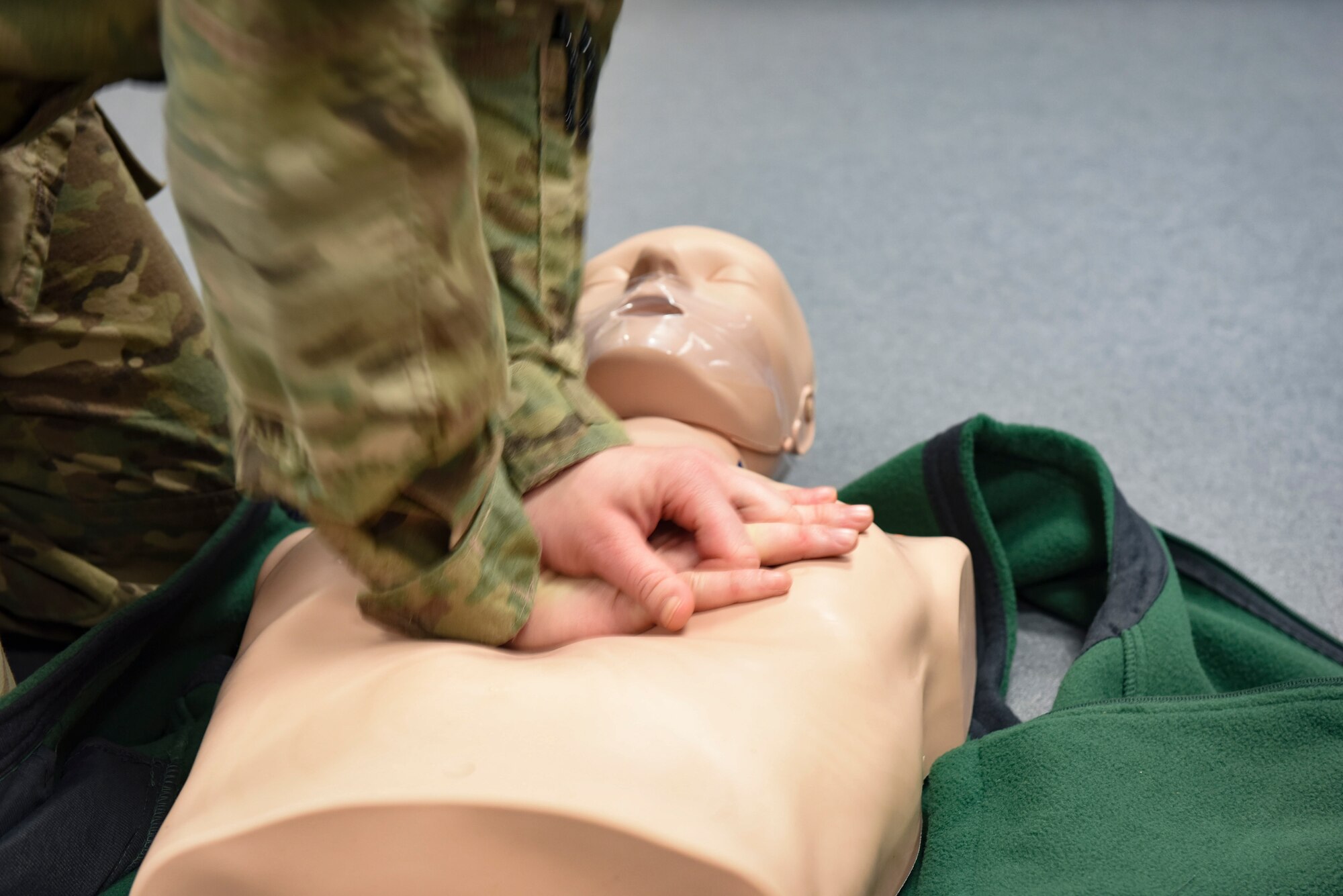 U.S. Air Force Airman Olivia Carroll, 786th Force Support Squadron personnel specialist, practices chest compressions during an adult cardiopulmonary resuscitation and automated external defibrillator class at Ramstein Air Base, Germany, Feb. 4, 2020. The 86th Medical Group education and training program offers adult CPR and AED classes three-to four-times weekly. Students become certified through the American Red Cross to administer life-saving techniques for adults, including CPR and abdominal thrust techniques. (U.S. Air Force photo by Senior Airman Elizabeth Baker)