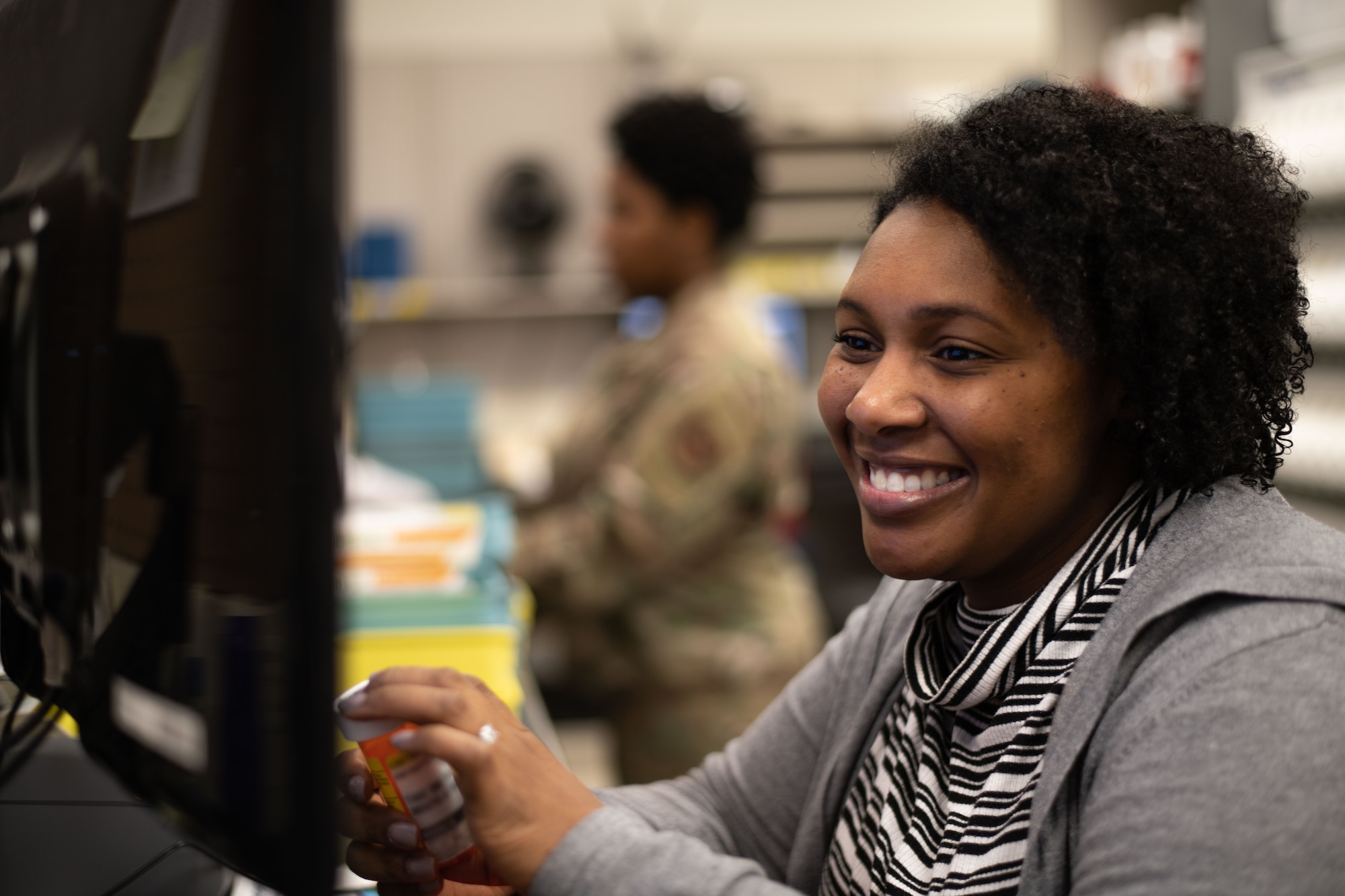 Gabrielle Ervin, Maxwell Pharmacist, looks over a patient’s information while sorting prescriptions at the Maxwell Pharmacy, Dec. 19, 2019, Maxwell Air Force Base, Alabama. The Maxwell Pharmacy is responsible for serving the 42nd Air Base Wing, Air University and all of the other tenant units on base, as well as communities across the state of Alabama. (U.S. Air Force photo by Senior Airman Alexa Culbert)