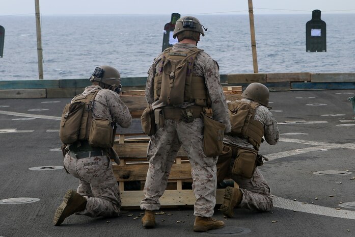 Marines assigned to Golf Company, Battalion Landing Team, 2nd Battalion, 8th Marine Regiment, 26th Marine Expeditionary Unit, conduct a live-fire training exercise aboard the amphibious dock landing ship USS Oak Hill.