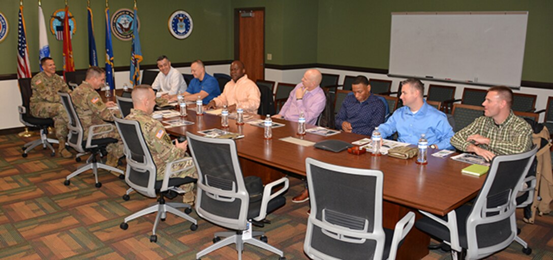 Army customer facing personnel meet with warrant officers with 128th Aviation Brigade.