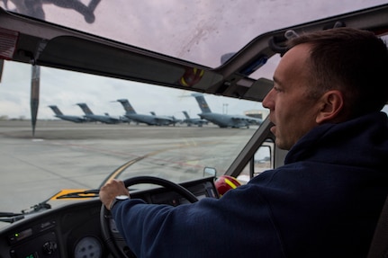 Matthew Callaghan, a firefighter assigned to the 628th Civil Engineer Squadron, inspects the flightline at Joint Base Charleston, S.C., Feb. 6, 2020. The base fire department runs daily operations to maintain readiness in case of emergencies such as structure or aircraft fires, injury and other mishaps.