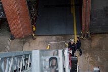 Brett Powers, a driver operator assigned to the 628th Civil Engineer Squadron fire department, controls a firetruck’s bucket at Joint Base Charleston, S.C., Feb. 6, 2020. The base fire department runs daily operations to maintain readiness in case of emergencies such as structure or aircraft fires, injury and other mishaps.