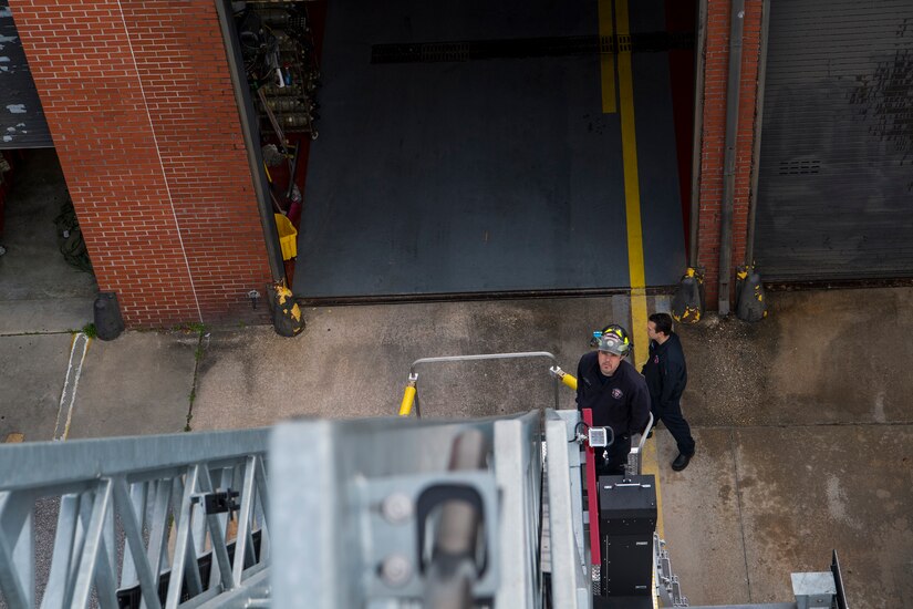 Brett Powers, a driver operator assigned to the 628th Civil Engineer Squadron fire department, controls a firetruck’s bucket at Joint Base Charleston, S.C., Feb. 6, 2020. The base fire department runs daily operations to maintain readiness in case of emergencies such as structure or aircraft fires, injury and other mishaps.