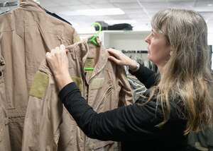 Staff Sgt. Frankie Mattox, a finance manager assigned to the 628th Comptroller Squadron, browses the uniform rack at the Airman’s Attic at Joint Base Charleston, S.C., Feb. 5, 2020. The Airman’s Attic, located in building 1950 on the Air Base, offers no-cost items including clothing, toys and household goods for military members E-5 and below and their immediate families. The recapitalization of the donated goods can help take care of service members and their families by alleviating various financial stressors they may encounter. (U.S. Air Force photo by Senior Airman Joshua R. Maund)