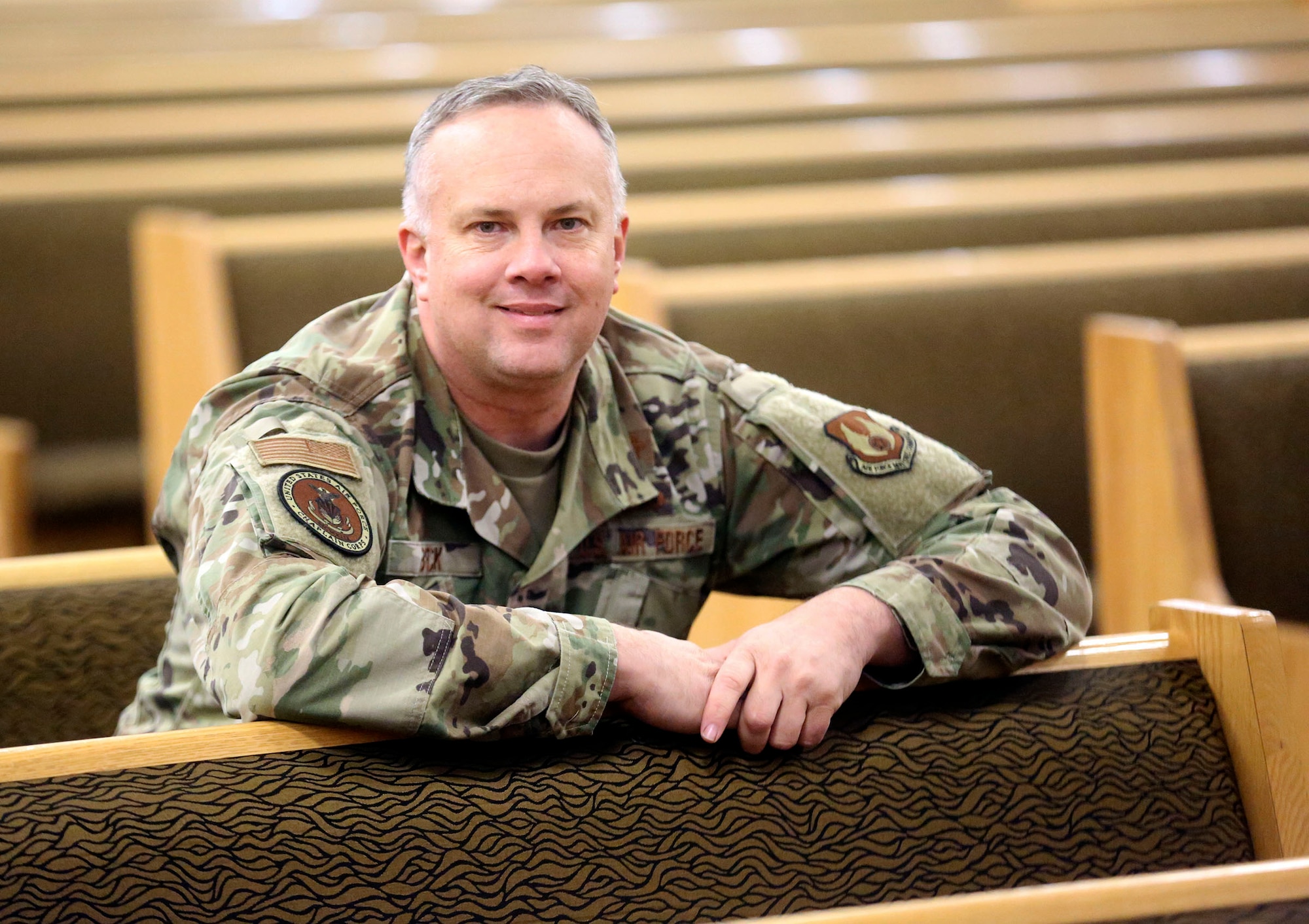 Lt. Col. Zebulon Beck, Hill Air Force Base wing chaplain, poses for a portrait in the base's sanctuary.