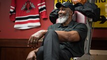 Karl Malone, NBA Hall of Famer, sits in a decommissioned aircraft seat in the 96th Bomb Squadron during a visit at Barksdale Air Force Base, La., Feb. 4, 2020. Malone spent time visiting with Airmen, touring various squadrons and even taking a ride in a B-52H Stratofortress. (U.S. Air Force photo by Airman 1st Class Jacob B. Wrightsman)