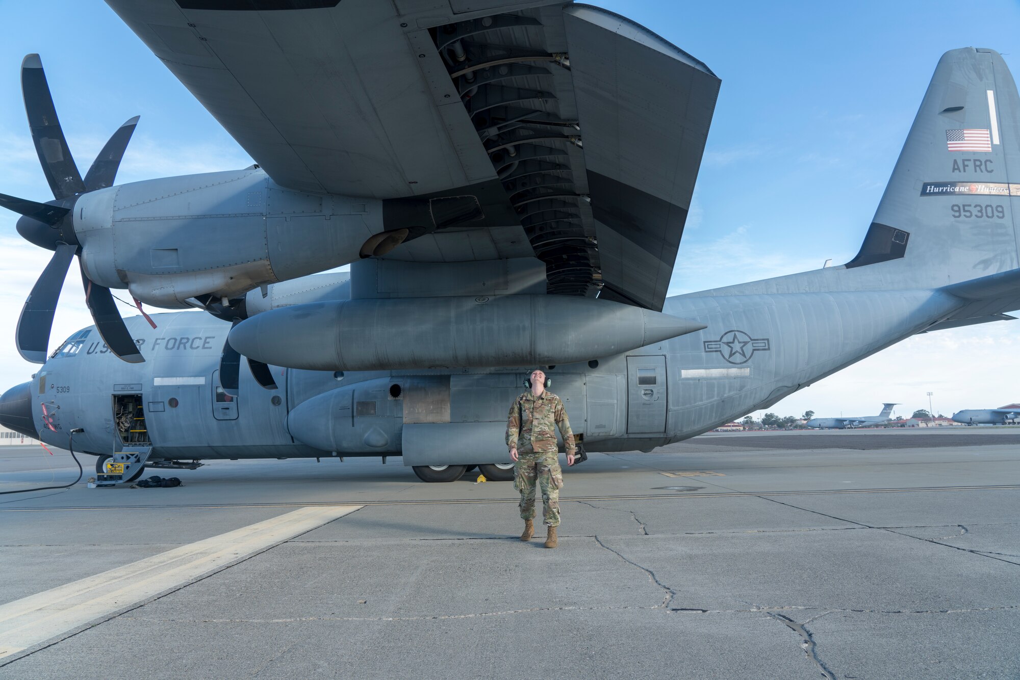 Tech. Sgt. Victoria Kinman, 403rd Aircraft Maintenance Squadron crew chief, inspects the wings of a WC-130J Super Hercules aircraft from the 53rd Weather Reconnaissance on the flightline prior to an atmospheric river mission Jan. 27 at Travis Air Force Base, Calif. The Hurricane Hunters are slated to perform “AR recon” from January through March. Scientists led by Scripps Institution of Oceanography at University of California, San Diego, in partnership with the 53rd WRS, National Oceanic and Atmospheric Aviation’s National Weather Service, Office of Marine and Aviation Operations, will be on standby to fly through these ARs over the Pacific to gather data to improve forecasts. (U.S. Air Force photo by Tech. Sgt. Christopher Carranza)