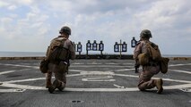 Marines assigned to Echo Company, Battalion Landing Team, 2nd Battalion, 8th Marine Regiment, 26th Marine Expeditionary Unit, shoot a table 5 modification course aboard the amphibious transport dock USS New York (LPD 21) while at sea, Jan. 30, 2020. Bataan Amphibious Ready Group, with embarked 26th MEU, is deployed to the U.S. 5th Fleet area of operations in support of maritime security operations to reassure allies and partners and preserve the freedom of navigation and the free flow of commerce in the region. (Marine Corps photo by Staff Sgt. Patricia A. Morris)