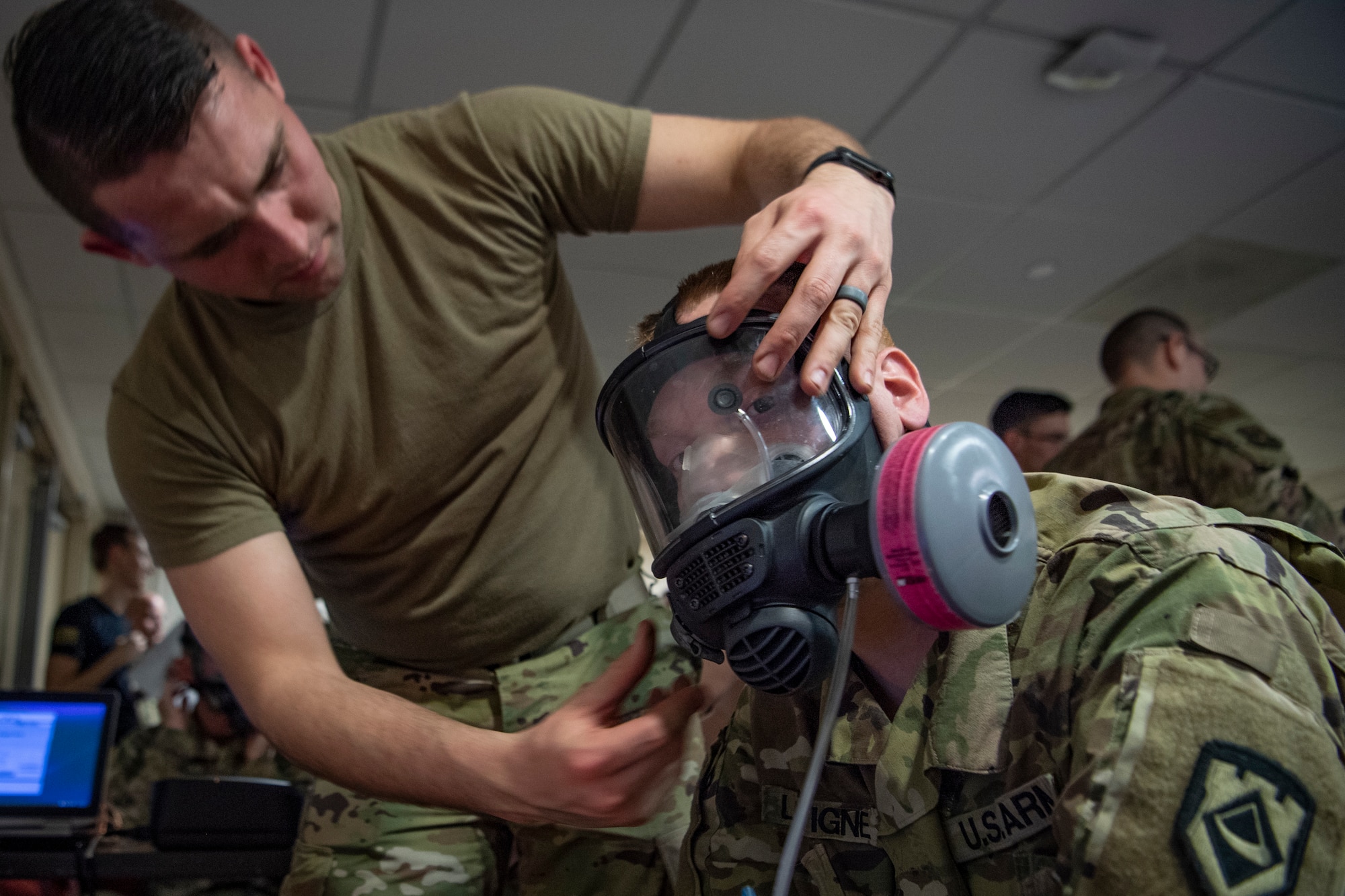 Sgt. David Dean (left) performs a mask fit test on Spc. Ian Lavigne (right), both assigned to West Virginia National Guard’s 35th Civil Support Team (CST) on Feb. 3, 2020 at Joint Base Anacostia Bolling, in preparation for the 2020 State of the Union Address. The 35th CST is a joint-force unit comprised of the 130th Airlift Wing’s CERF-P Detachment and Soldiers from the West Virginia Army National Guard, who’s mission is to preposition at high-profile events in preparation to support civil authorities at domestic Chemical, Biological, Radiological, Nuclear or Explosive (CBRNE) incident sites. (U.S. Air National Guard Photo by Staff Sgt. Caleb Vance)