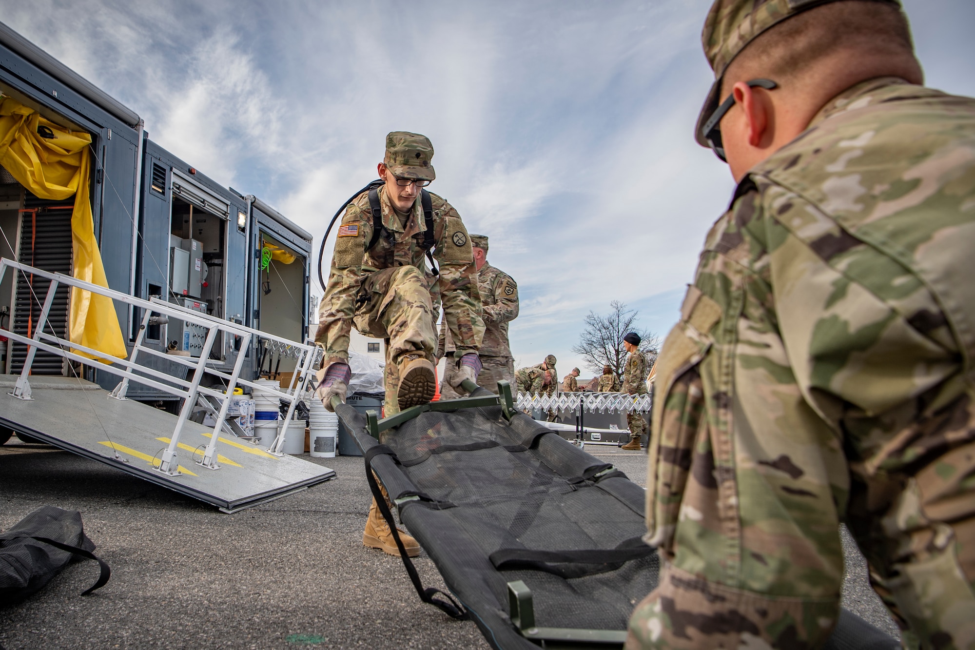 Spc. Alexander Dyer, a member of the West Virginia National Guard’s 35th Civil Support Team,, prepares a gurney while participating in a response rehearsal on Feb. 3, 2020 at Joint Base Anacostia Bolling, in preparation for the 2020 State of the Union Address. The 35th CST is a joint-force unit comprised of the 130th Airlift Wing’s CERF-P Detachment and Soldiers from the West Virginia Army National Guard, who’s mission is to preposition at high-profile events in preparation to support civil authorities at domestic Chemical, Biological, Radiological, Nuclear or Explosive (CBRNE) incident sites. (U.S. Air National Guard Photo by Staff Sgt. Caleb Vance)