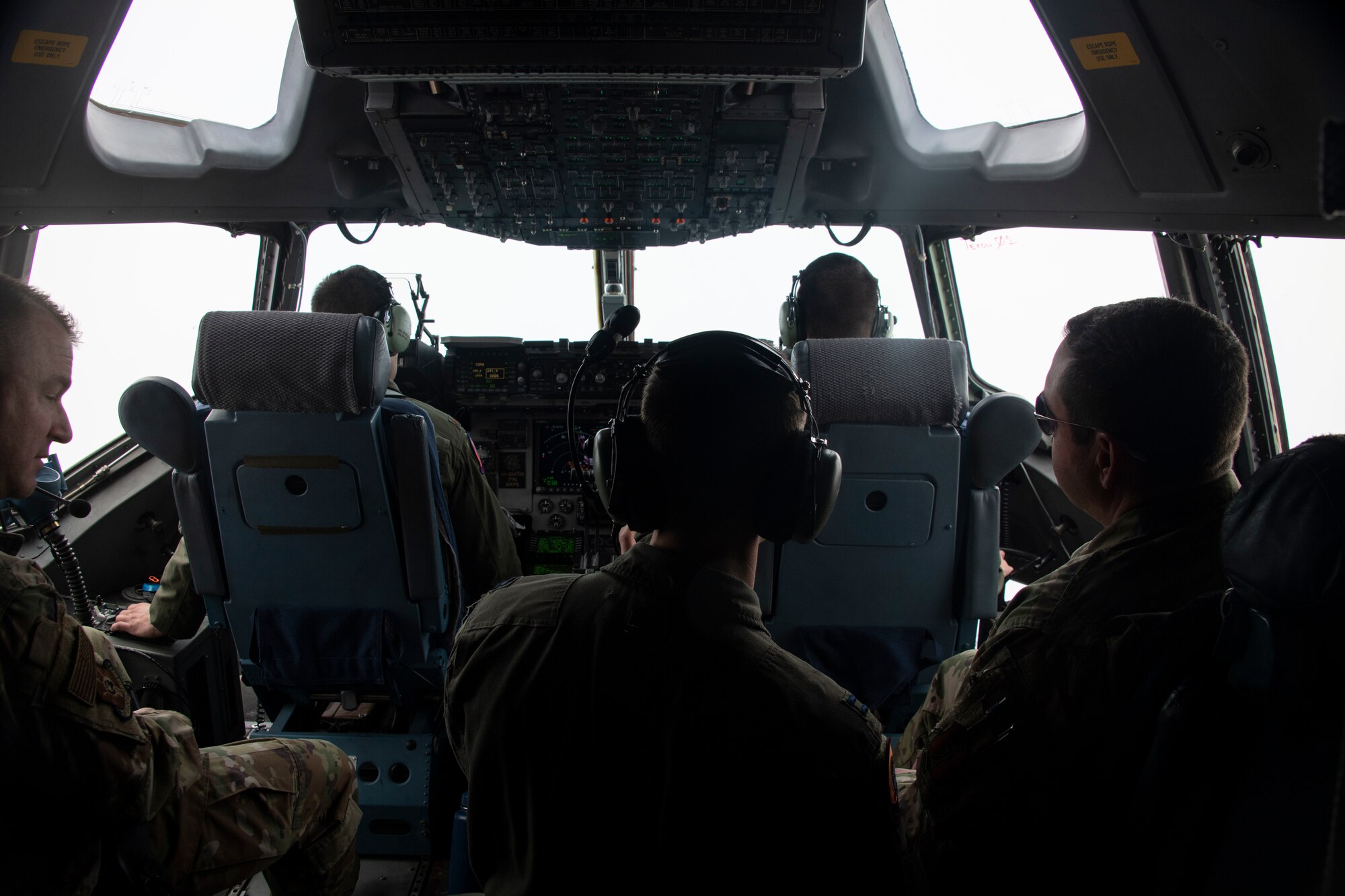 U.S. Air Force Capt. Mark Benischek, the wing tactics flight commander assigned to the 97th Operations Support Squadron, briefs training operations to members of the Oklahoma Commanders Summit