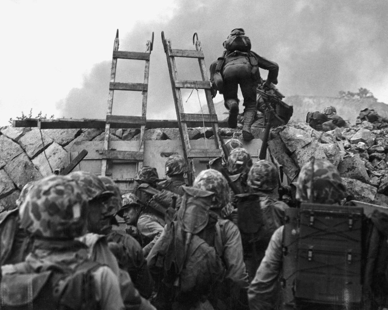 During Korean War, Marines use scaling ladders to storm ashore at Inchon in amphibious invasion on September 15, 1950 (U.S. Marine Corps/National Archives and Records Administration/W.W. Frank)