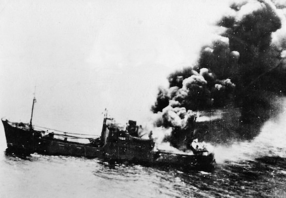Struck by bomb in Battle of Bismarck Sea, Japanese merchantman burns fiercely, March 2, 1943 (U.S. Army/National Archives and Records Administration)