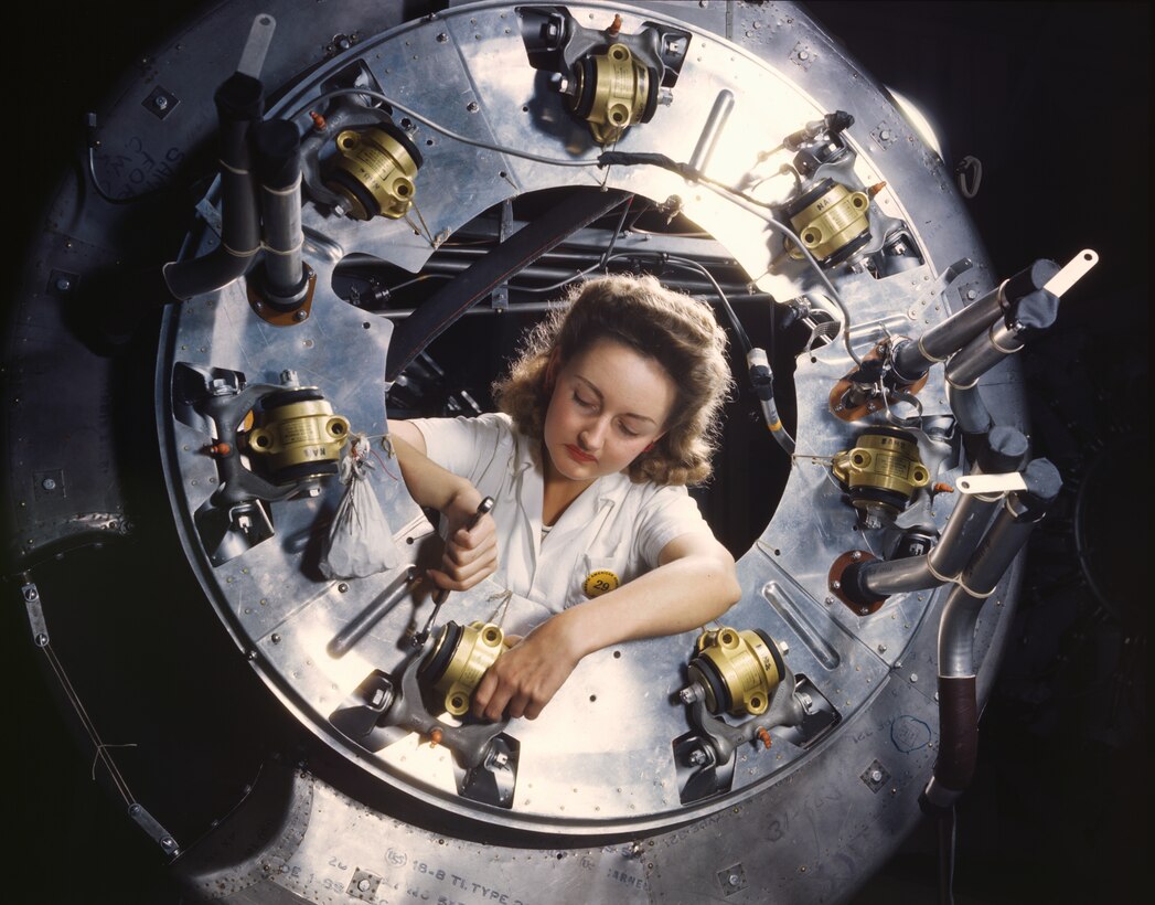 Part of cowling for B-25 bomber motor is assembled in engine department of North American Aviation’s plant in Inglewood, California, October 1942
(Library of Congress/Alfred T. Palmer)