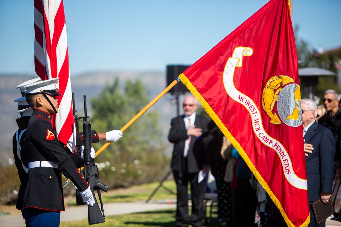 The Marine Corps Base Camp Pendleton Color Guard presents the colors during a wreath laying ceremony for the 109th anniversary of President Ronald Reagan’s birthday at the Ronald Reagan Presidential Library in Simi Valley, California, Feb. 6.