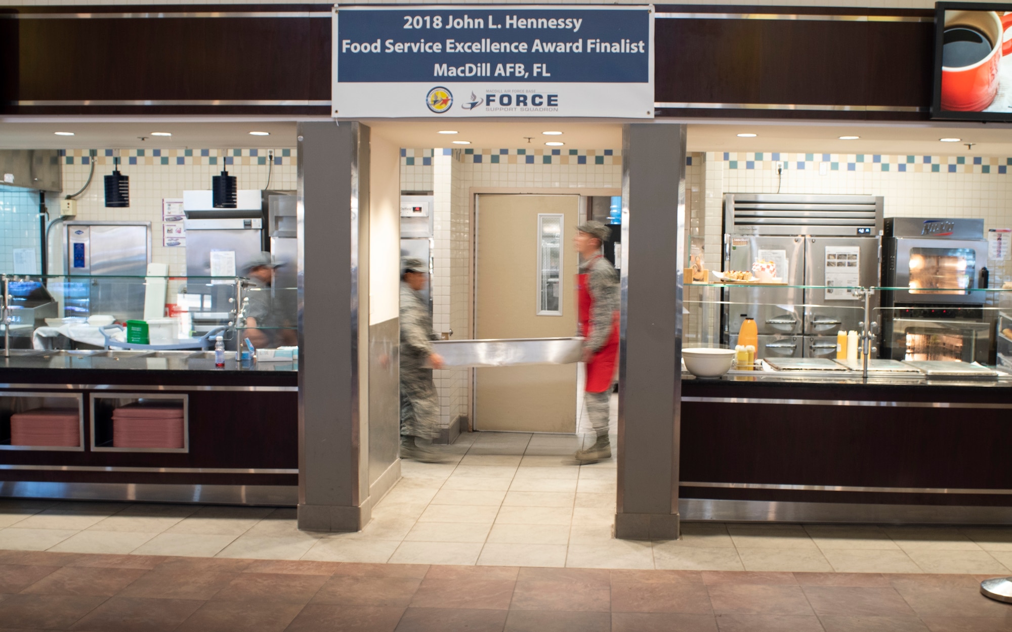 Airmen from the 6th Force Support Squadron Diner’s Reef dining facility work to break down the kitchen line after providing lunch to service members across the installation at MacDill Air Force Base, Fla., Jan. 30, 2020.