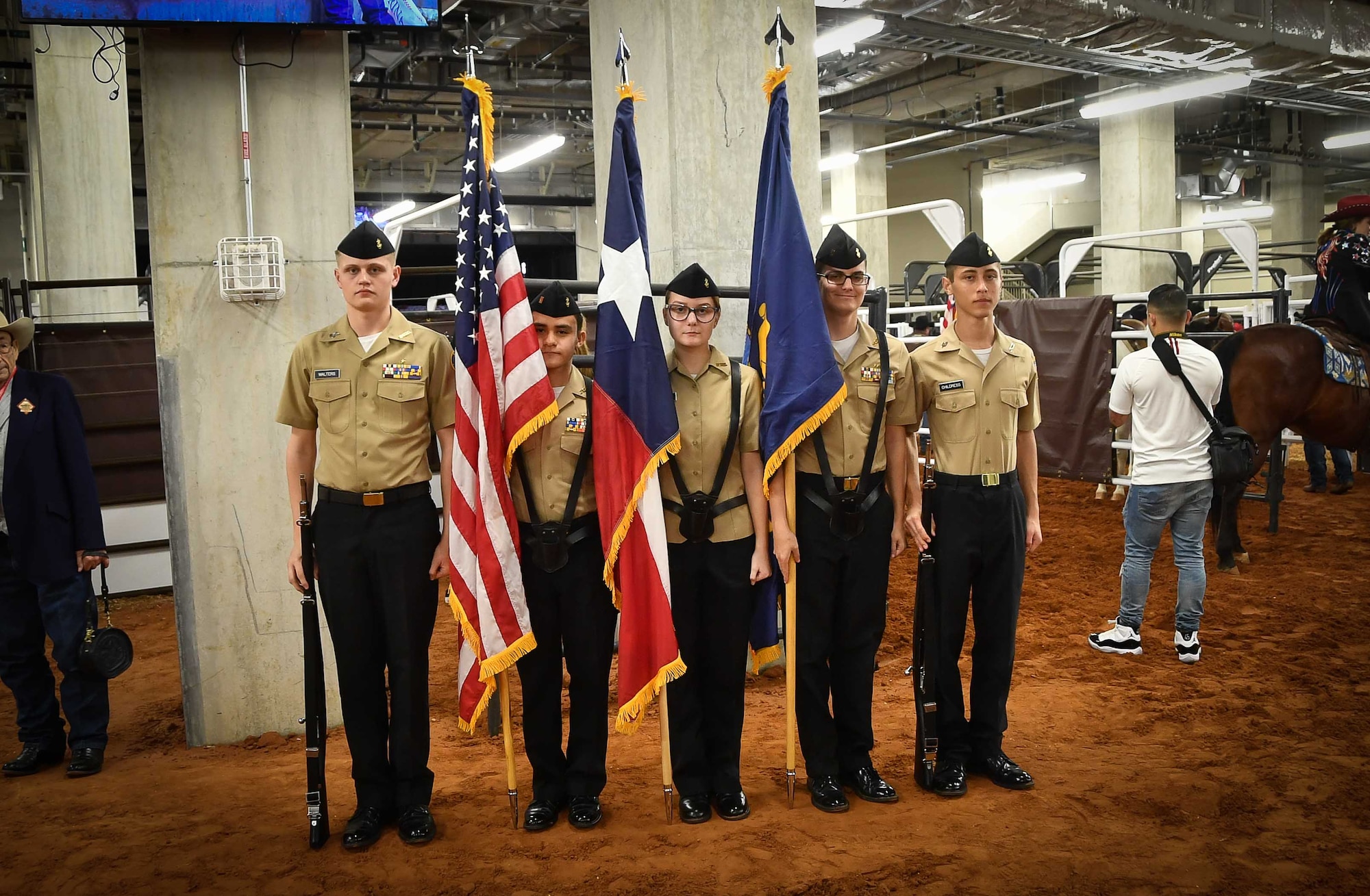 U.S. Navy JROTC cadets from Joshua High School, Joshua, Texas prepare to post the colors prior to the Military Appreciation Day Grand Entry at the Fort Worth Stock Show and Rodeo at Dickie’s Arena on February 3, 2020. This was the first year this event was held in the new arena. (U.S. Air Force Photo by Master Sgt. Jeremy Roman)