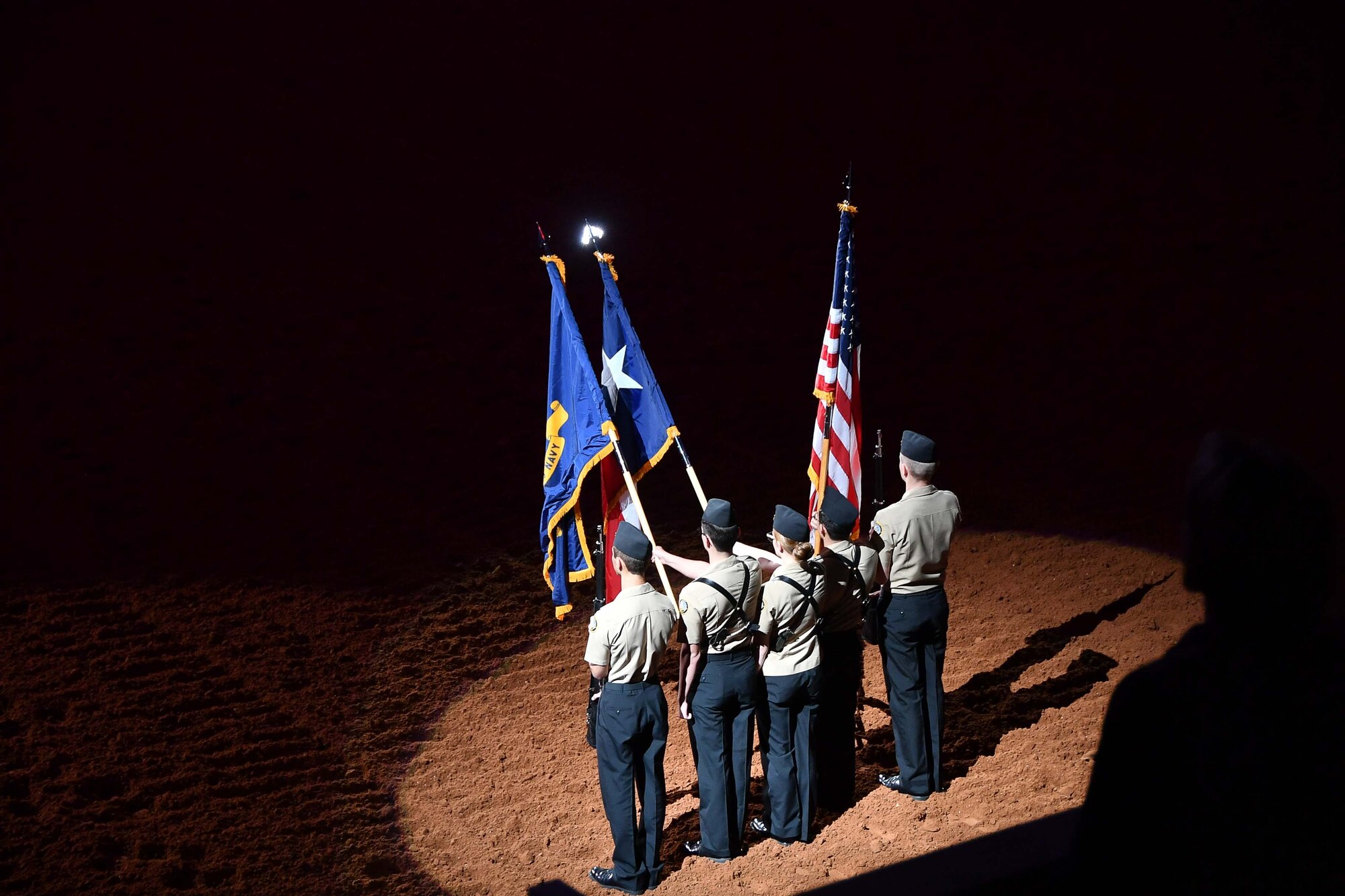 U.S. Navy JROTC cadets from Joshua High School, Joshua, Texas post the colors as the crowd sings the U.S. national anthem during the Military Appreciation Day at the Fort Worth Stock Show and Rodeo at Dickie’s Arena on February 3, 2020. Prior to the rodeo events, each military branch was announced and veterans past and present were asked to stand and be recognized. (U.S. Air Force Photo by Master Sgt. Jeremy Roman)