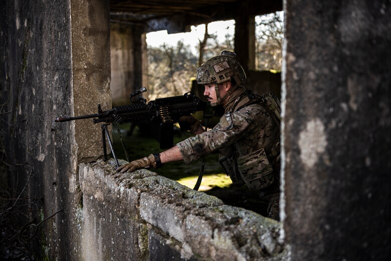 Staff Sgt. holds security during exercise Frozen Defender