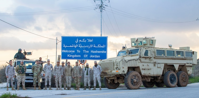 Jordan Armed Forces-Arab Army (JAF) Soldiers pose for a photo with Military Engagement Team-Jordan, 158th Maneuver Enhancement Brigade, Arizona Army National Guard, during a Mine Resistant Ambush Protected Wheeled Armored Vehicle Subject Matter Expert Exchange at a base outside of Amman, Jordan in January. The U.S. military has a long-standing relationship with Jordan to support our mutual objectives by providing military assistance to the JAF consistent with our national interests. (U.S. Army photo by Sgt. 1st Class Shaiyla B. Hakeem)