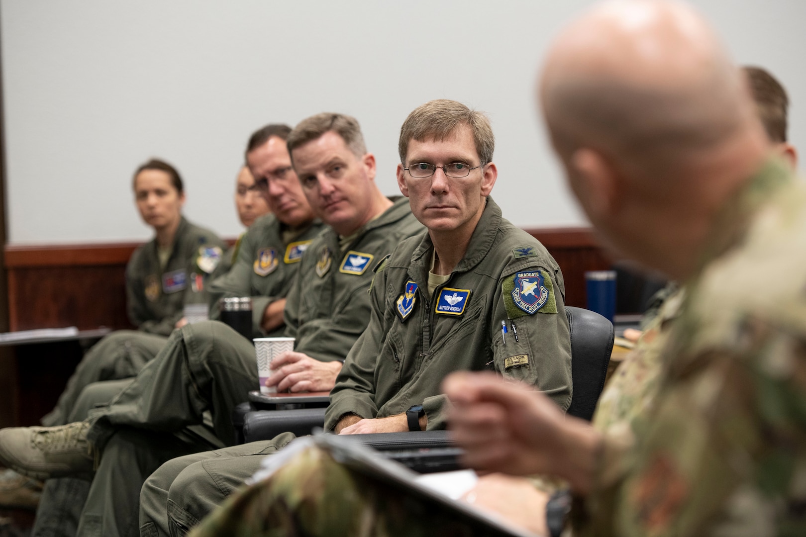 Col. Matthew Domsalla,12th Flying Training Wing vice commander, listens during a Total Force Integration briefing Feb. 4 at Joint Base San Antonio-Randolph, Texas. TFI works to improve integration between active-duty Air Force, Air Force Reserve, and the Air National Guard.(U.S. Air Force photo by Sabrina Fine)