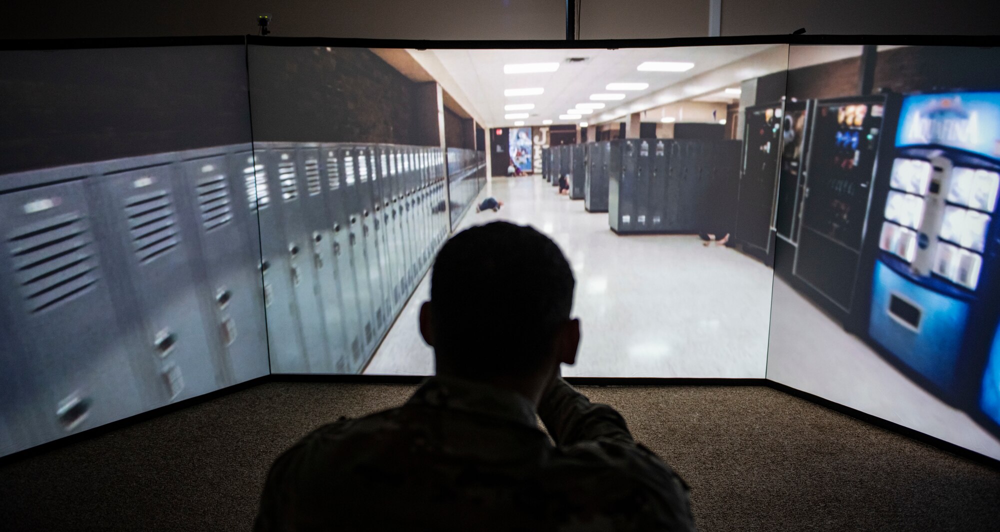 U.S. Air Force Staff Sgt. Thomas Badders, 325th Security Forces Squadron noncommissioned officer in charge of confinement, makes his way through a virtual active shooter training scenario at Tyndall Air Force Base, Florida, Feb. 5, 2020. Security Forces uses the Multiple Interactive Learning/Training Objectives Range to put it’s members in a life-like scenario. (U.S. Air Force photo by Senior Airman Stefan Alvarez)