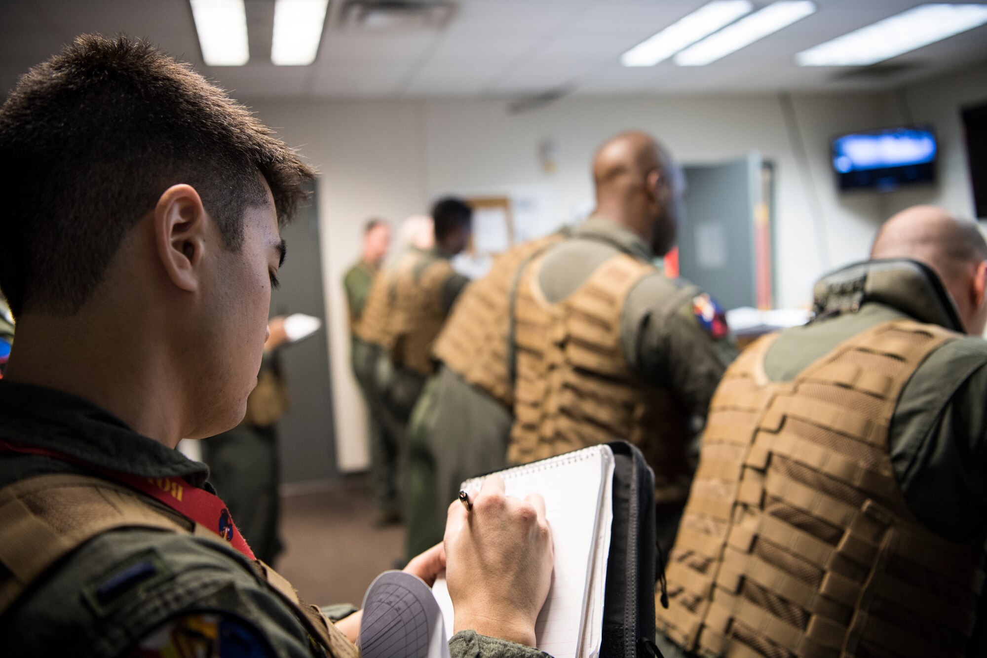 Aircrews from the 23rd Bomb Squadron, Minot Air Force Base, North Dakota complete a mission brief before flying to swap aircraft with B-52Hs currently deployed to Anderson Air Base, Guam, Feb. 3, 2020. U.S. Strategic Command has conducted bomber task force missions since 2014 as a demonstration of the U.S. commitment to collective security, and to integrate with Geographic Combatant Command operations. (U.S. Air Force photo by Staff Sgt. Keifer Bowes)