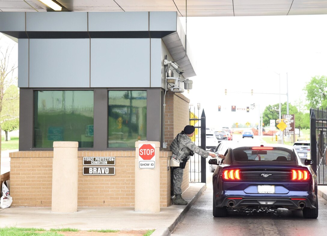 The 72nd Security Forces Squadron has implemented additional Force Protection security measures. With these heightened measures, drivers can help alleviate gate congestion at high traffic times during the day by always having ID's and Common Access Cards ready, leaving the house 10-15 minutes early and if your unit is allowing delayed reporting, please do so. (U.S. Air Force photo/Kelly White)