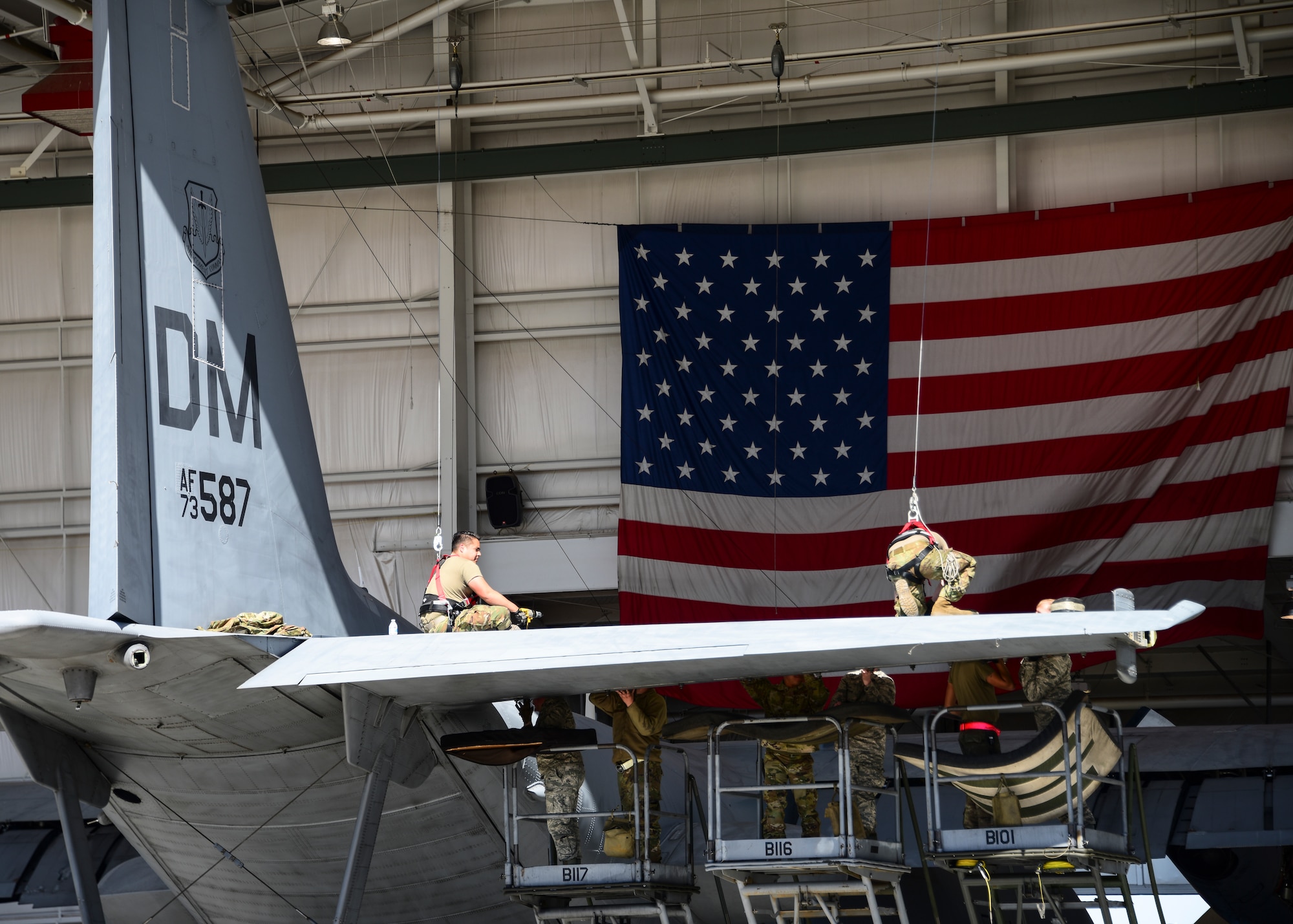 Maintainers work on aircraft