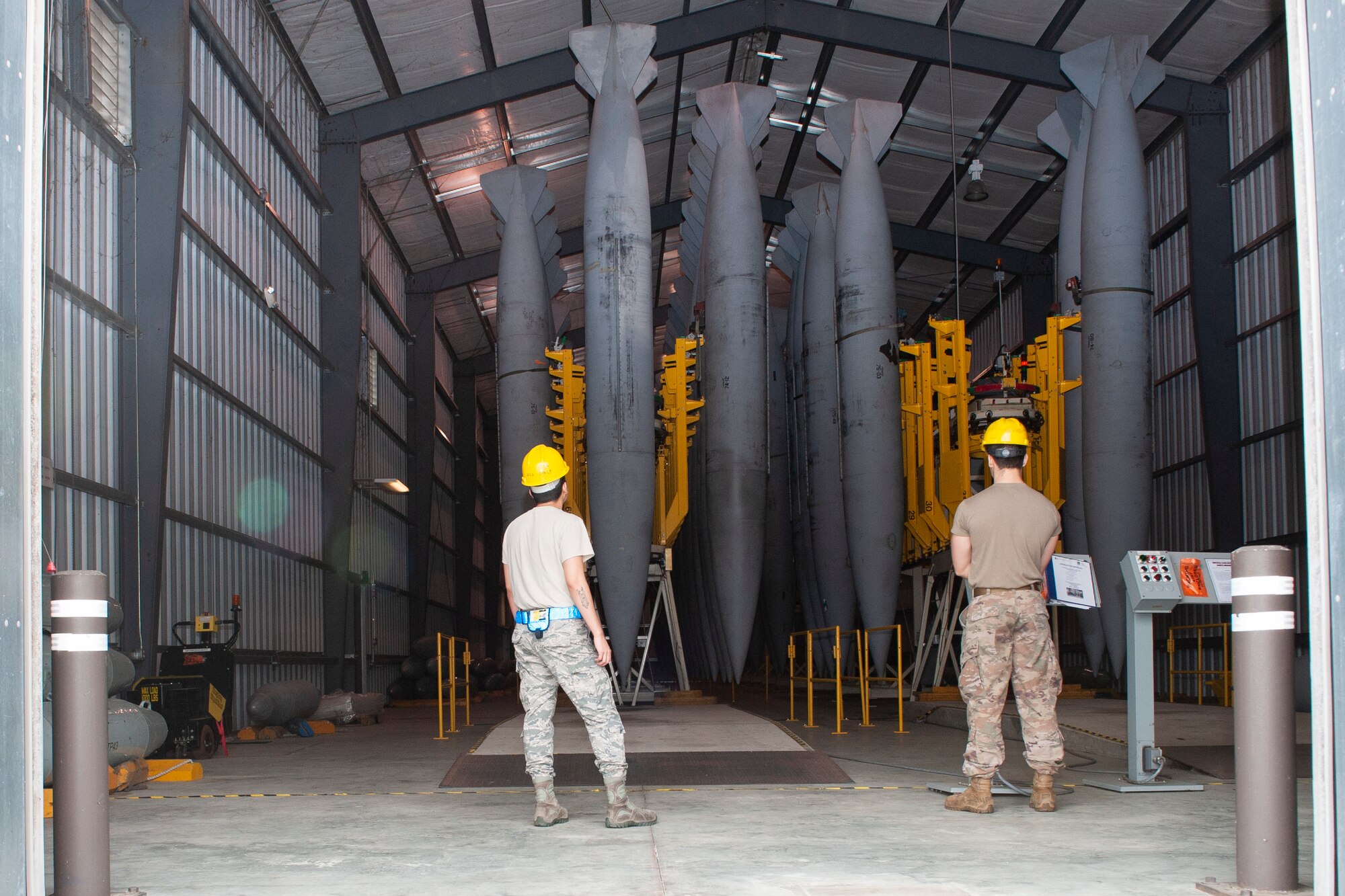 Photo of Airmen preparing to inspect a fuel cell
