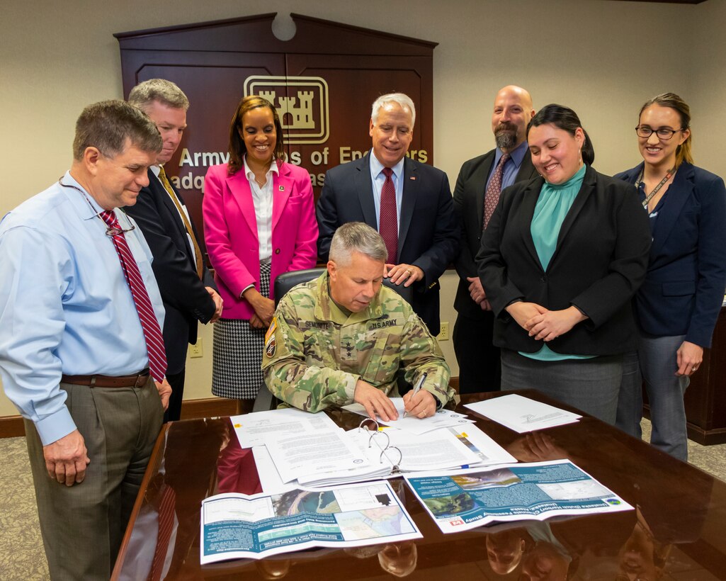 Lt. Gen. Todd Semonite, commanding general of the U.S. Army Corps of Engineers and 54th U.S. Army Chief of Engineers, signs the Unalaska (Dutch Harbor) Channels Chief's Report in Washington, D.C. The signing progresses the proposed project to Congress for authorization. (Photo by Rob Thomas, USACE Headquarters)