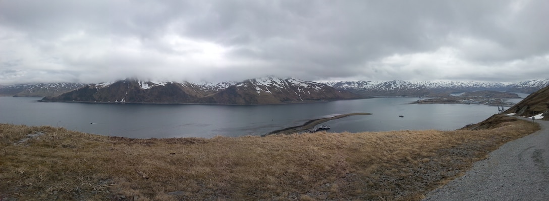 Panoramic view overlooking Dutch Harbor and Iliuliuk Bay with Unalaska in the distance. The final feasibility study recommends deepening the existing bar to -58 feet providing one-way access for ships with a draft up to 44 feet. Currently, the bar accommodates vessels with a draft of 38 feet. (Photo by Chris Hoffman, USACE - Alaska District)