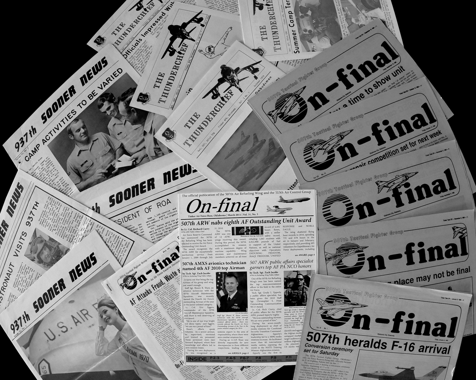 Printed copies of the Sooner News, Thunderchief and On-final newspapers are displayed on a table Feb. 7, 2020, at Tinker Air Force Base, Oklahoma. The 507th Air Refueling Wing Public Affairs office published 30 years worth of historic newspapers in January of this year. (U.S. Air Force photo by Tech. Sgt. Samantha Mathison)