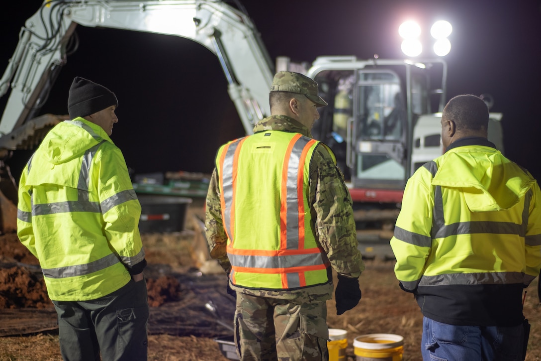 Col. Marvin L. Griffin, Huntsville Center commander, center, talks with the professionals working on a chemical warfare materiel remediation project at Redstone Arsenal, Alabama, Jan. 16, 2020, for which Huntsville Center’s Chemical Warfare Design Center is serving as executing agent.