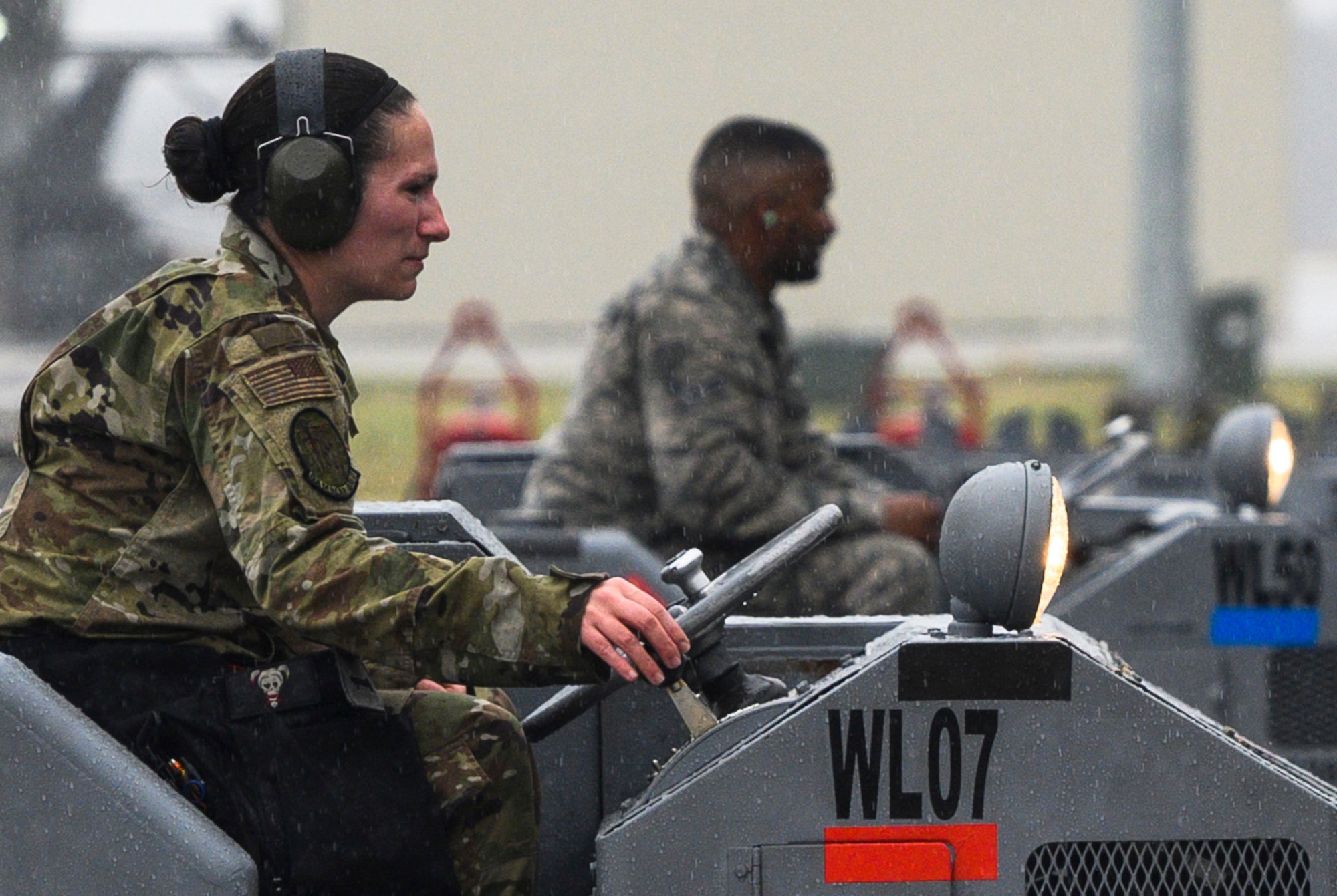 Senior Airman Breanna Miller operates a bomb loader