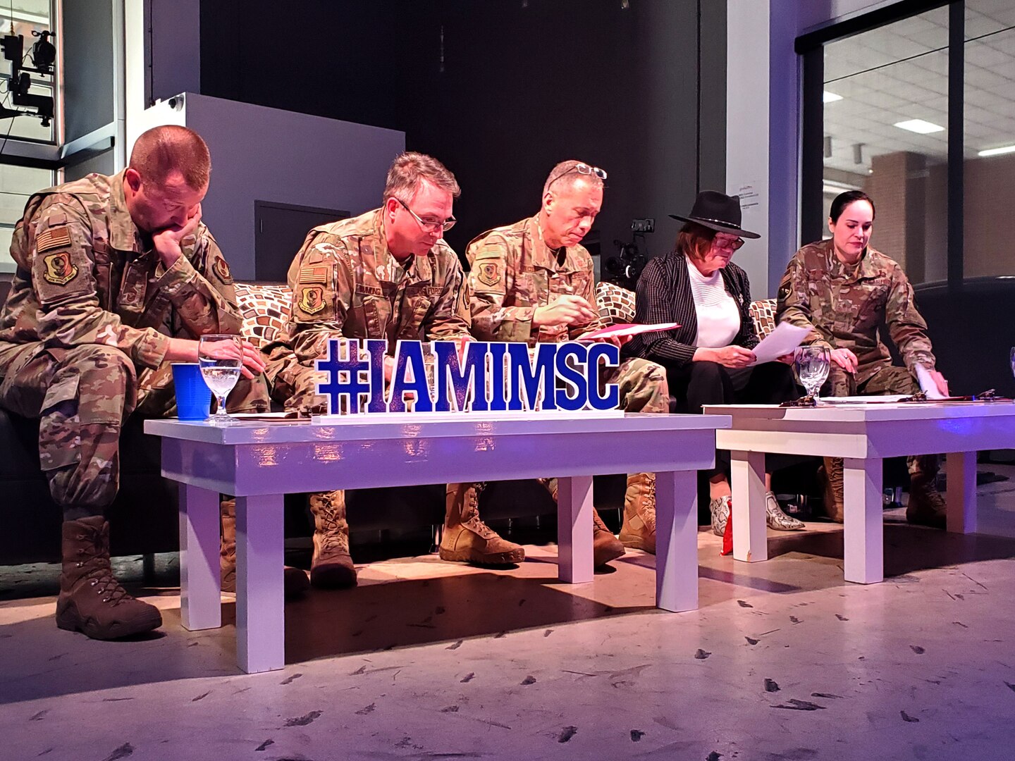 From left, 2020 AFIMSC Innovation Rodeo panel members Chief Master Sgt. Edwin Ludwigsen, Brig. Gen. Stewart Hammons, Maj. Gen. Tom Wilcox, Lorna Estep and Brig. Gen. Alice Trevino deliberate following a presentation Feb. 7, 2020.