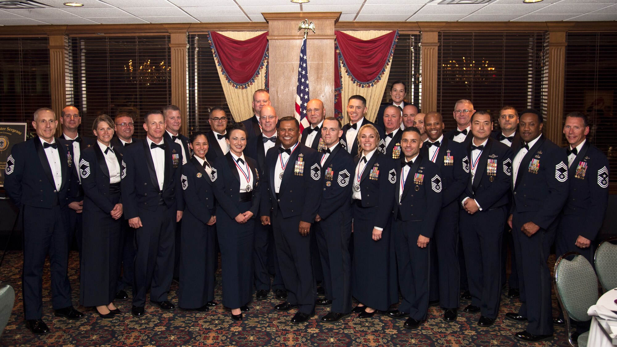 U.S. Air Force chief master sergeant selects and current Chiefs pose for a photo during a Chief’s Induction Ceremony, Jan. 31, in Tampa, Fla. Only 1% of enlisted Airmen reach the rank of chief master sergeant.