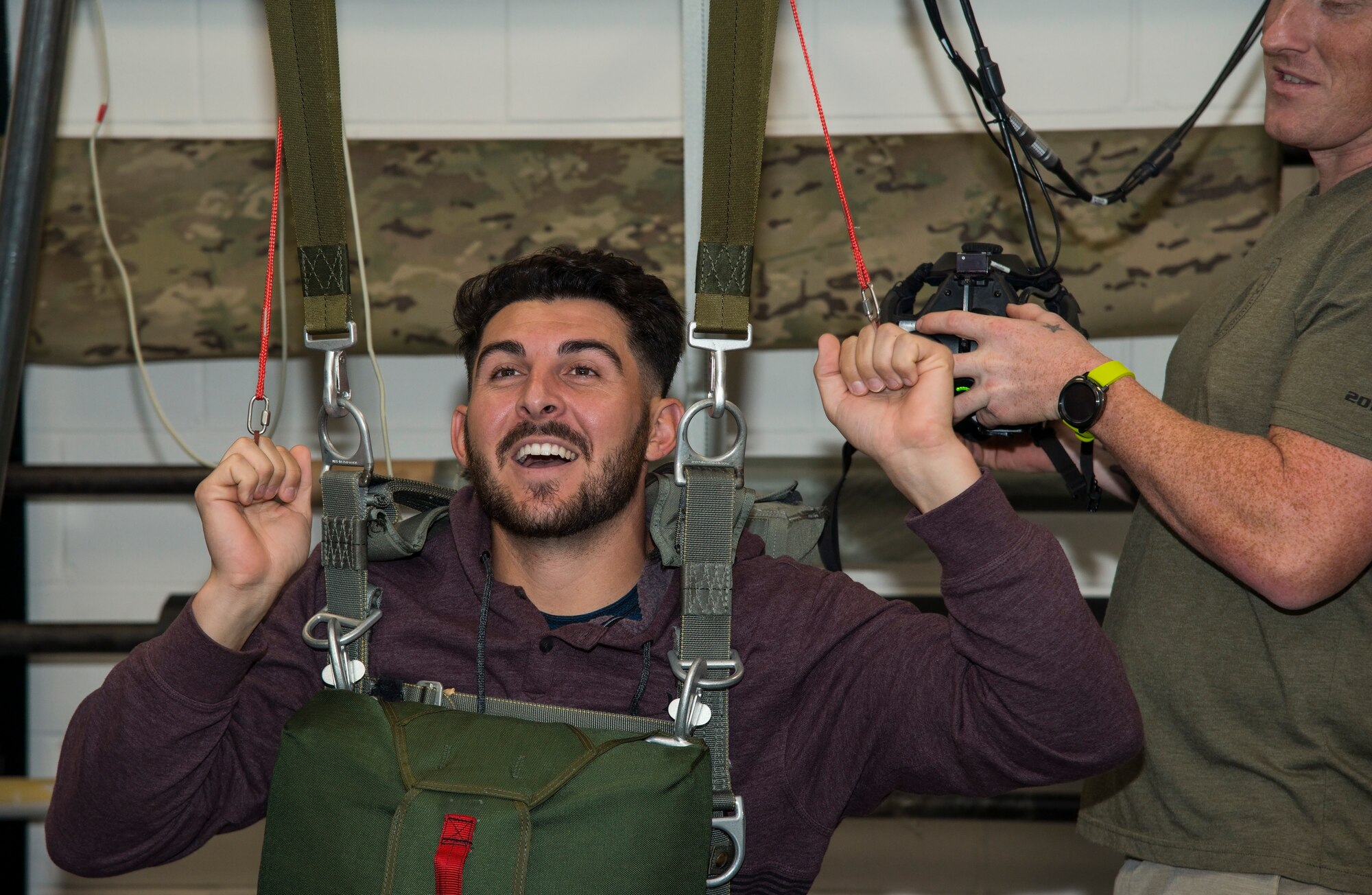 Miami Marlins pitching prospect Alex Vesia suits up for a paratrooper jump simulator at MacDill Air Force Base, Fla., Jan. 28, 2020.